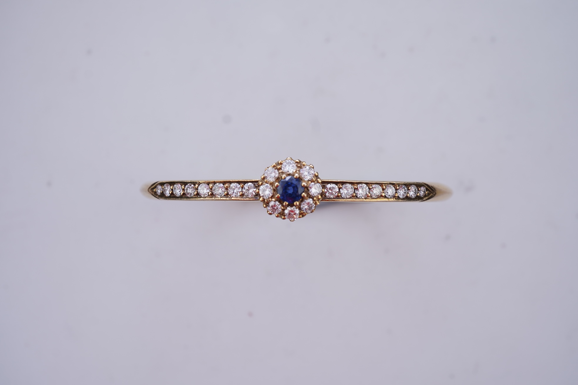 A sapphire and diamond bangle